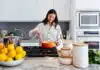 woman cooking inside kitchen room