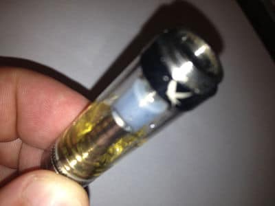 Clearomiseur d'e-cigarette avec réservoir transparent et drip tip