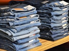 pile of blue denim jeans lot