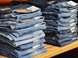 pile of blue denim jeans lot