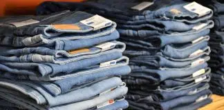 pile of blue denim jeans lot